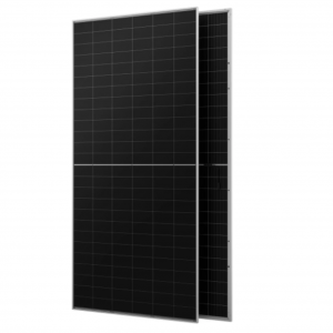 Two tall black solar panels with grid lines and silver frames standing upright in a pair.